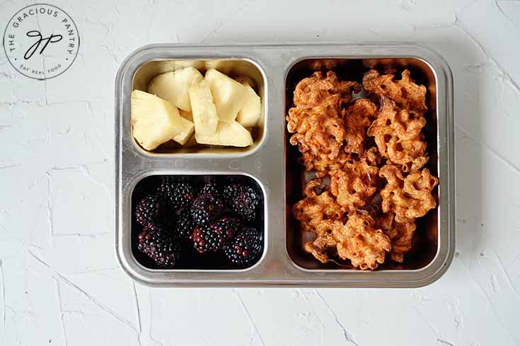 And overhead view looking down into a packed bento-style lunchbox.