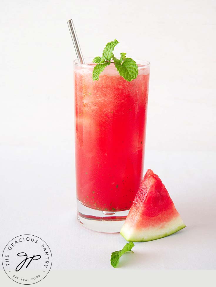 A single glass of Watermelon Agua Fresca With Mint.