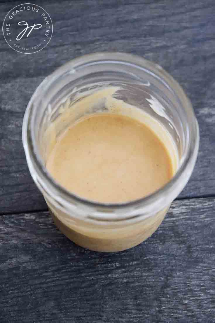 A finished jar of Chick Fil A Sauce.