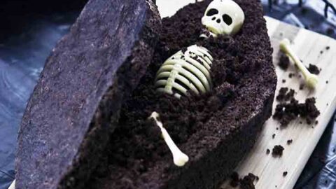 Coffin Bread Recipe - A skeleton lays in a chocolate, sweet bread coffin.