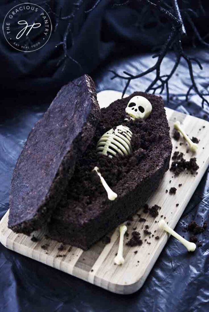 Coffin Bread Recipe - A skeleton lays in a chocolate, sweet bread coffin.
