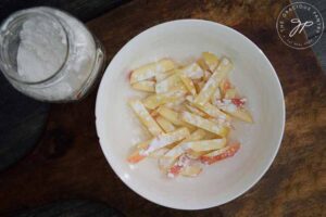 Step 3 - toss your apples with the arrowroot powder