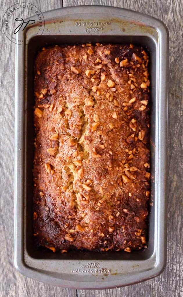 Overhead view of healthy apple bread in the loaf pan, just out of the oven.