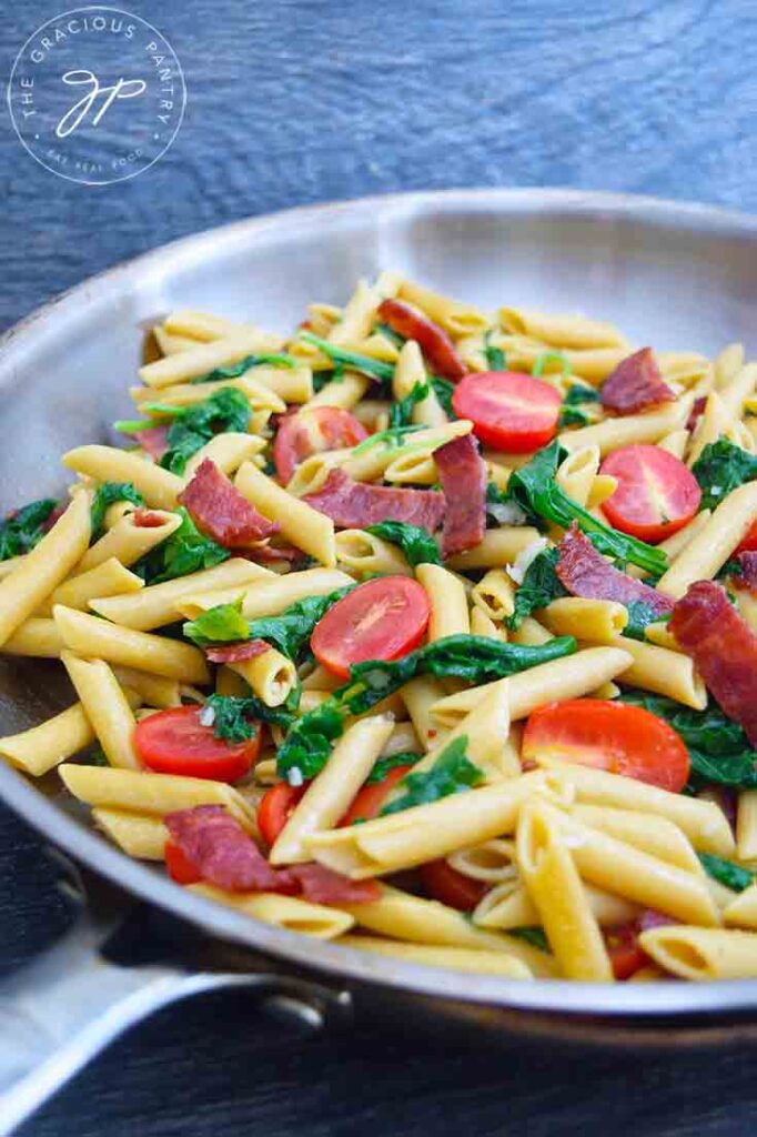 A skillet full of this just-made Baby Kale Pasta Recipe.