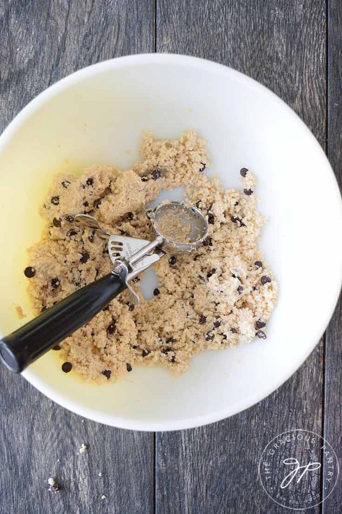 Overhead shot looking down into mixing bowl filled with edible cookie dough.