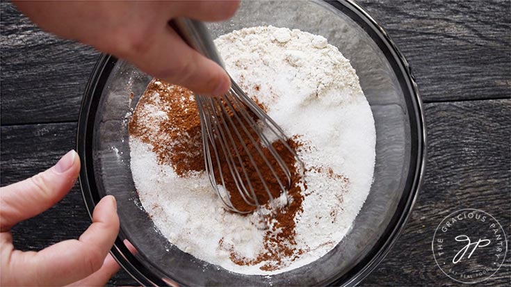 Whisking the dry ingredients together.