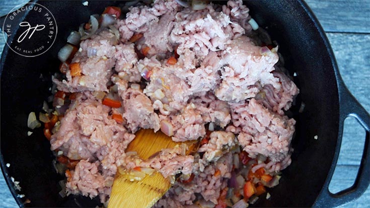 Stirring in the ground turkey.