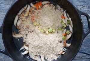 Optional mushroom powder added to pot.