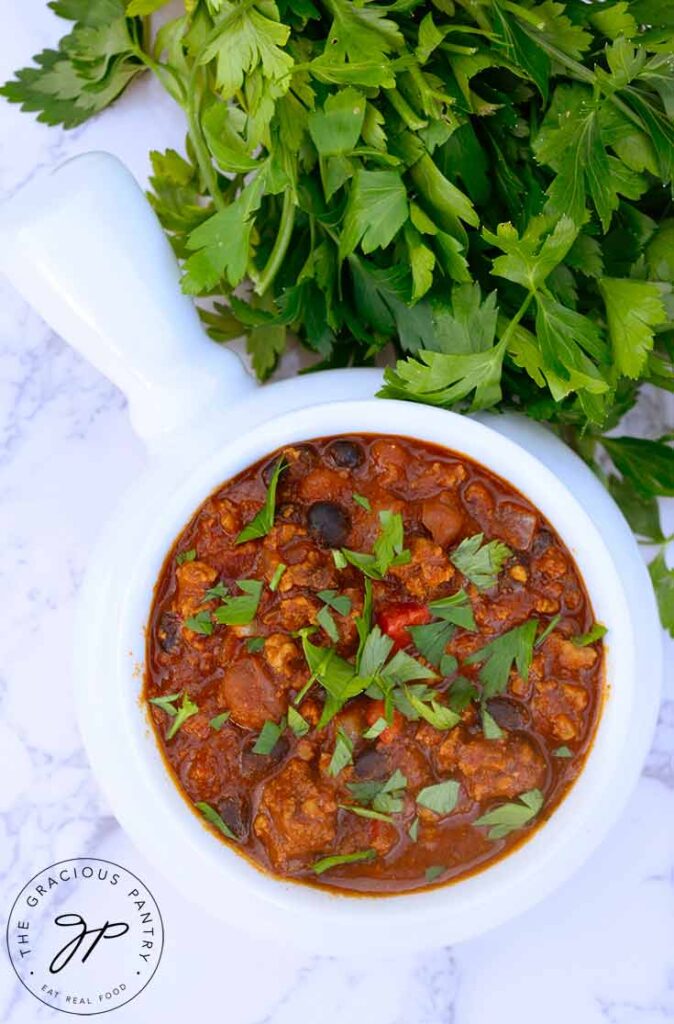 An overhead view looking down into a crock of turkey chili.