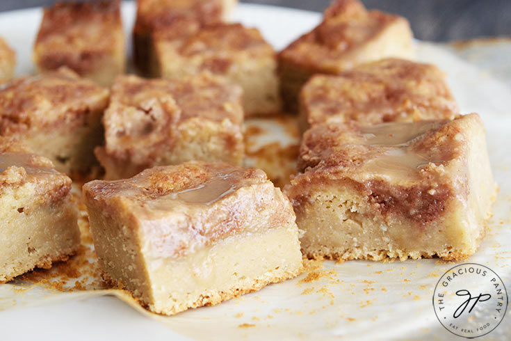 Cut coffee cake on a serving platter, ready to serve.