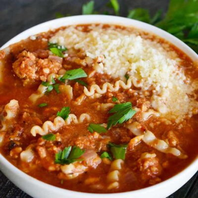 Lasagna Soup recipe in a white bowl.