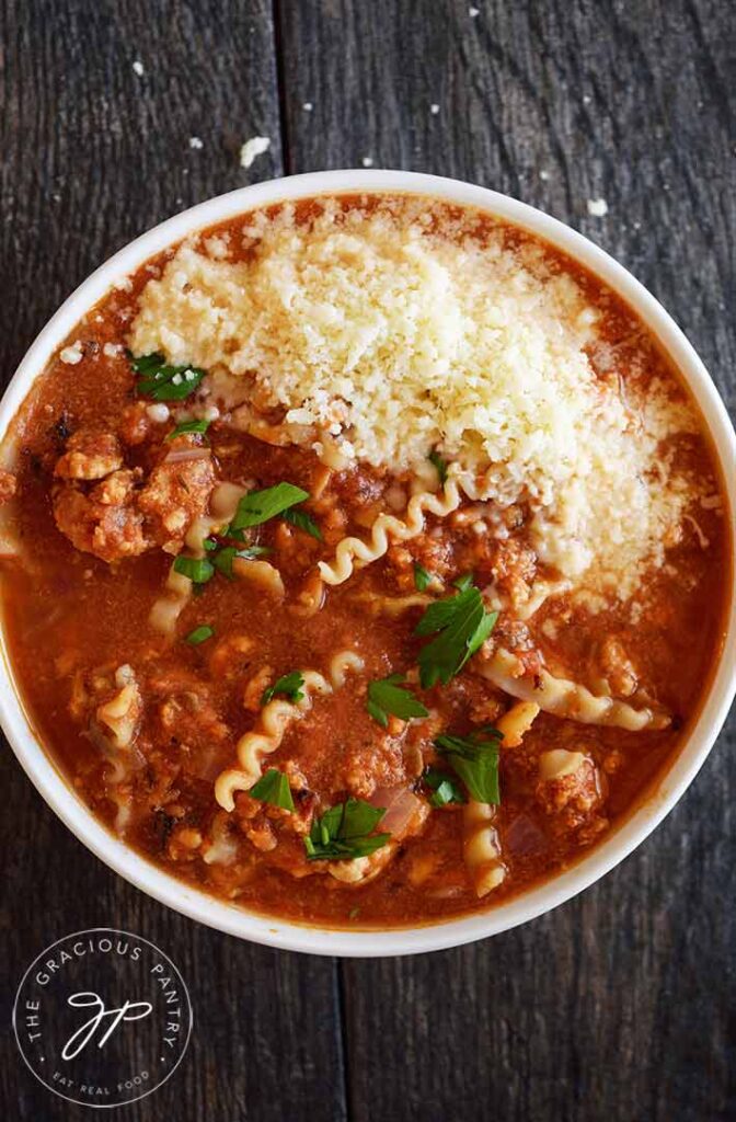 Overhead view of this lasagna soup recipe served in a white bowl, ready to eat.