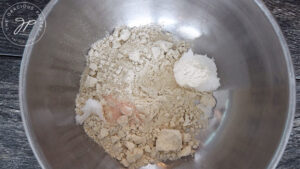 All the oat flour pie crust ingredients in a large mixing bowl.