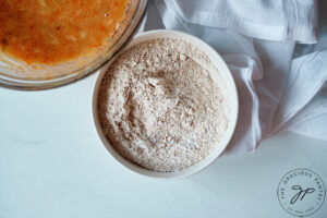 The flour and persimmon pulp in separate bowls.