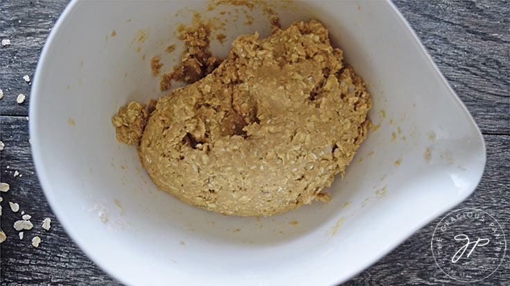 The kneaded dough sitting in the mixing bowl, waiting to be scooped onto cookie trays.