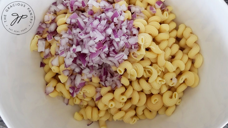 Onions added to the pasta.