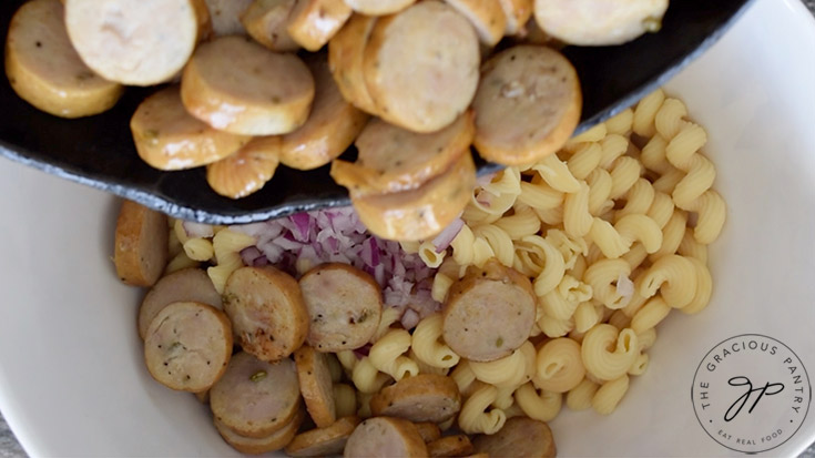 Sautéd sausage added to the pasta.