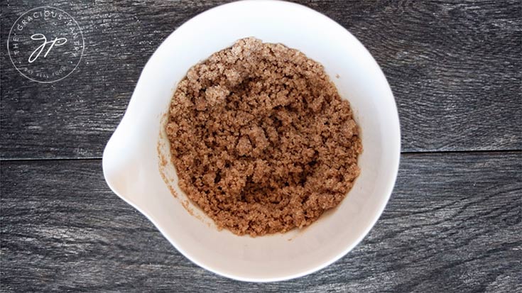 Mixing all the topping ingredients together in a medium mixing bowl.