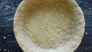 An overhead shot of the finished oat flour pie crust.
