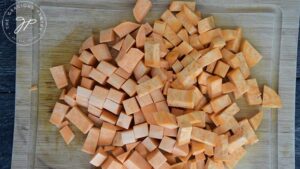 A pile of chopped sweet potatoes.