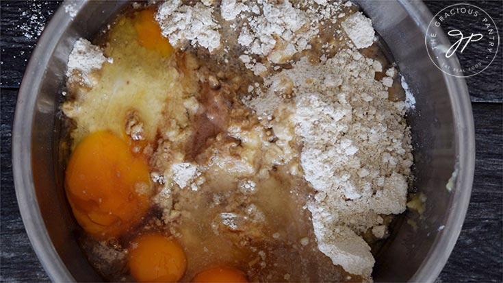 All ingredients in this Oat Flour Banana Bread Recipe, added to a mixing bowl.