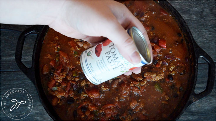 Adding the optional can of tomato paste to the Dutch Oven Chili Recipe for thickness.