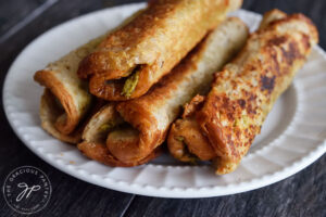 Air fried grilled cheese roll ups on a plate