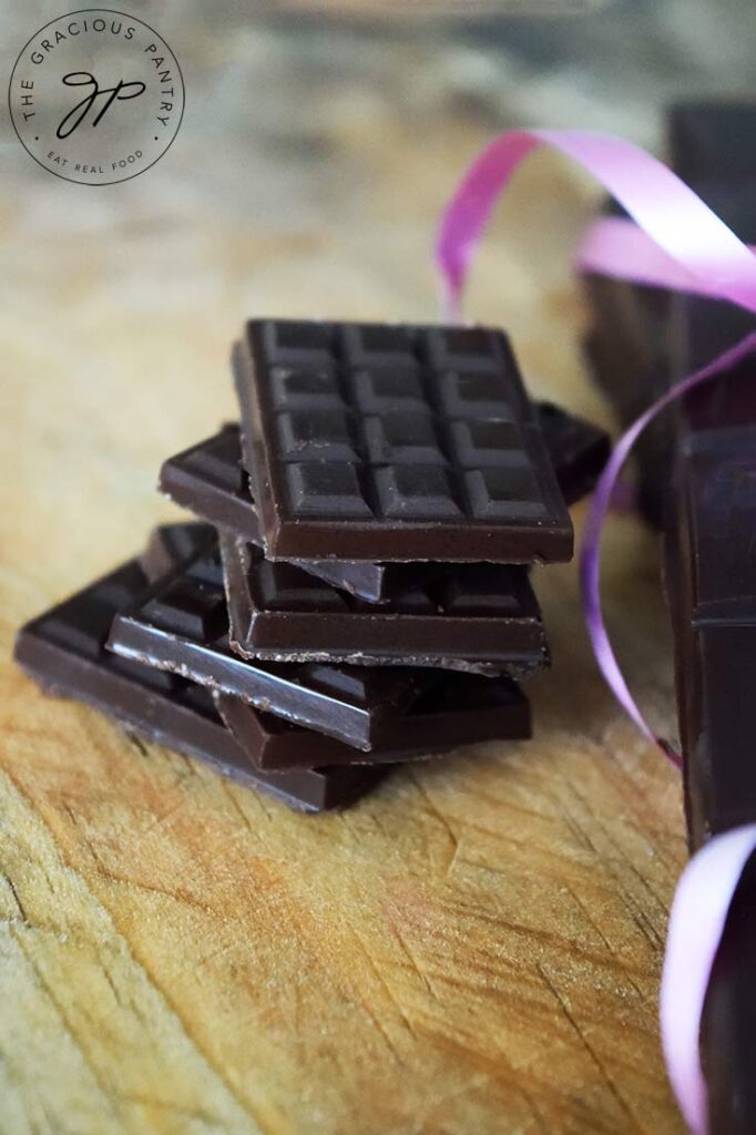 A front view of a stack of mini chocolates made from this chocolate bars recipe.