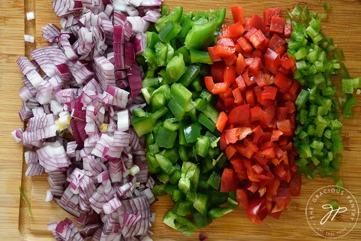 Chopped veggies freshly cut for making this Dutch Oven Chili Recipe.