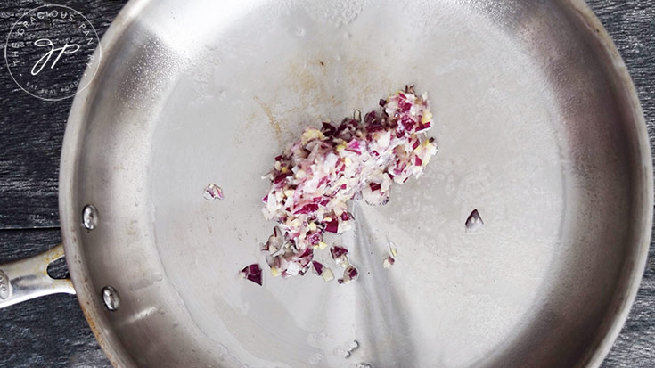 Sautéing the onion mixture.