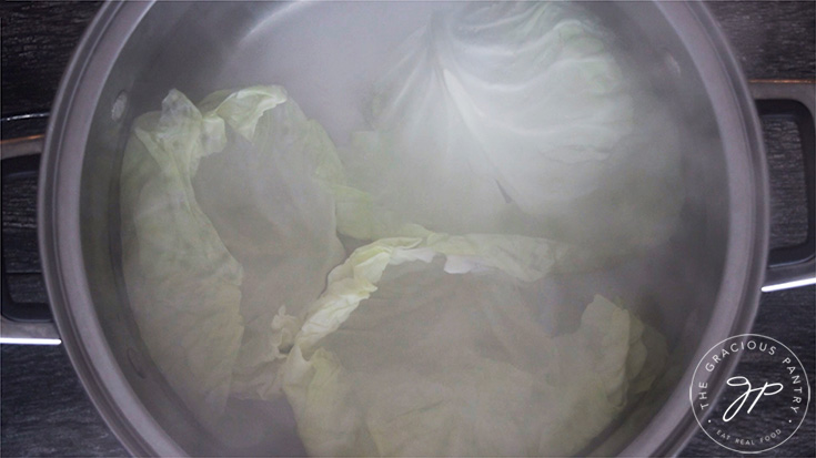 Blanching the cabbage leaves for this Mexican Cabbage Rolls Recipe.
