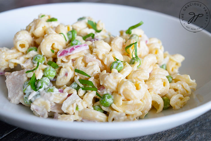 Side view of a bowl filled with this Tuna Pasta Salad Recipe