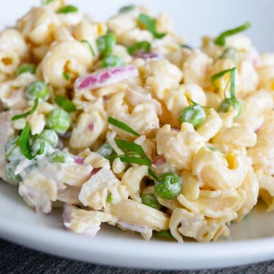 A white pasta bowl filled with this Tuna Pasta Salad Recipe.