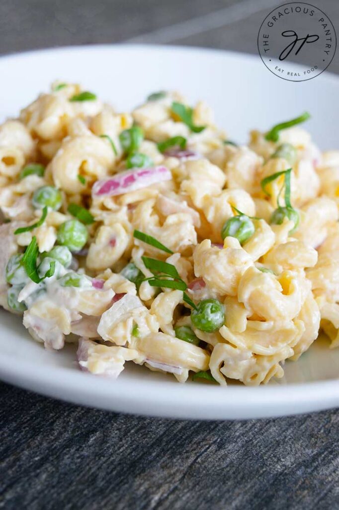 A white pasta bowl filled with this Tuna Pasta Salad Recipe.