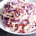 A front view of this Cabbage Salad recipe in a white bowl.