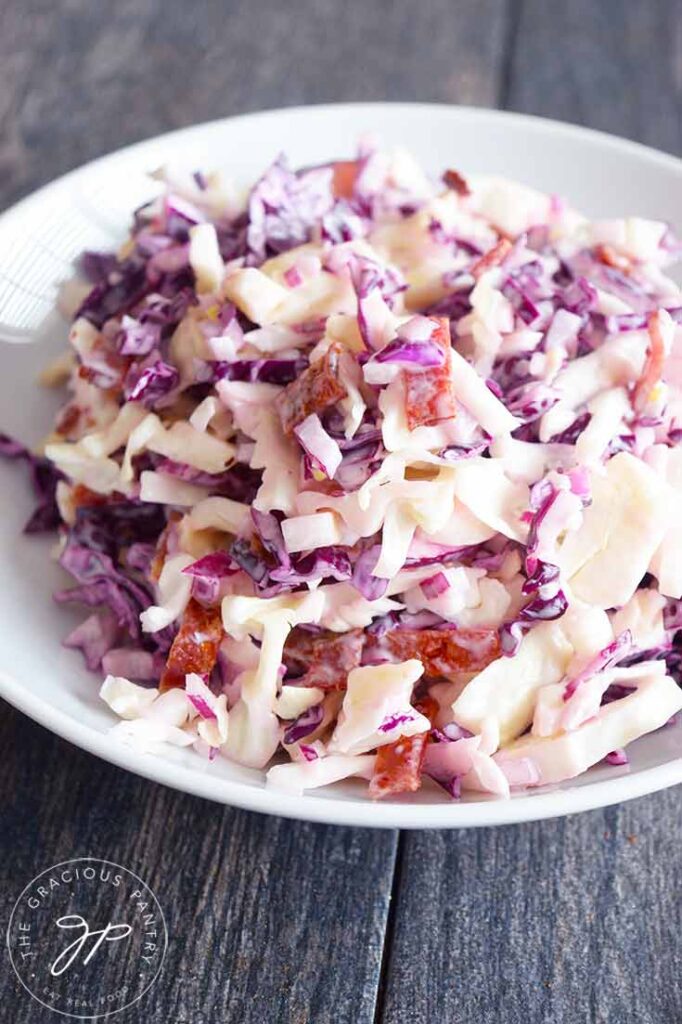 A front view of this Cabbage Salad recipe in a white bowl.