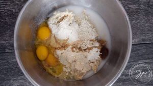 All the ingredients for these Leftover Oatmeal Pancakes in a mixing bowl.