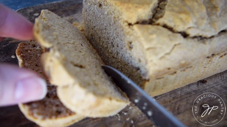 Slicing the loaf of Peanut Butter Bread.