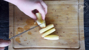 Chopping the apples for this Roasted Potato Salad Recipe