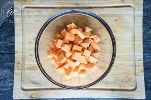 The chopped sweet potatoes in the mixing bowl for this Roasted Potato Salad Recipe.