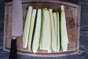 The zucchini cut into sticks.