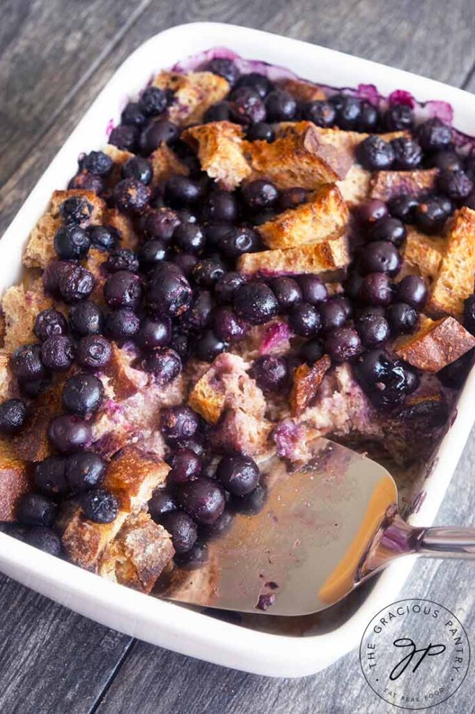 Blueberry French Toast Casserole in a white casserole dish.