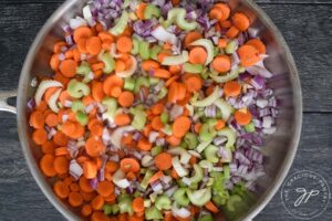 Sautéing the vegetables for this Healthy Chicken And Dumplings Recipe.