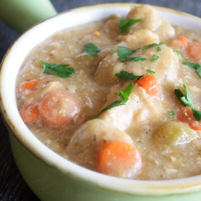 A green crock filled with this Healthy Chicken And Dumplings Recipe