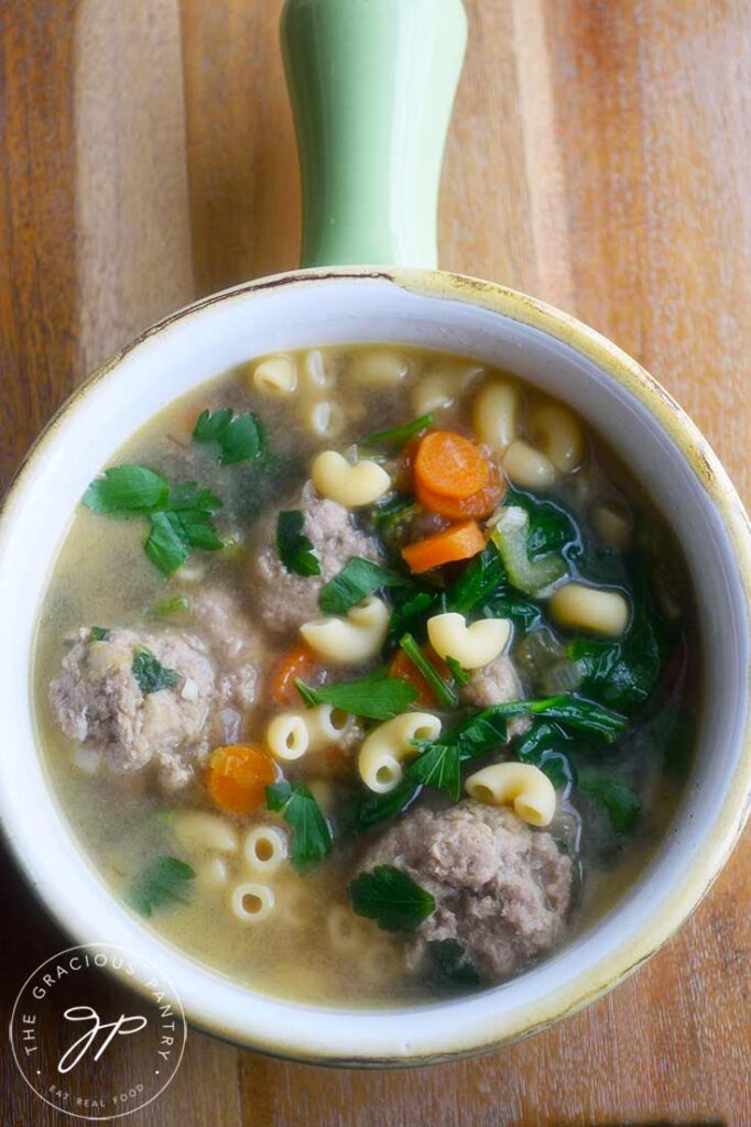 And overhead view of a crock filled with this Healthy Italian Wedding Soup.