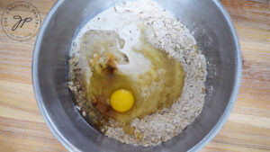 The wet ingredients for these Oat Flour Muffins added to the mixing bowl.