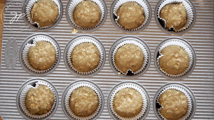 The cupcake liners filled with oat flour muffin batter.