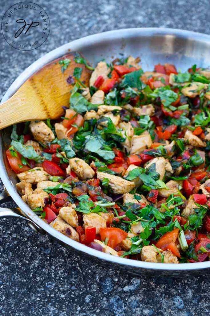 A side view of the just-cooked Bell Pepper Chicken Recipe, still in the skillet.