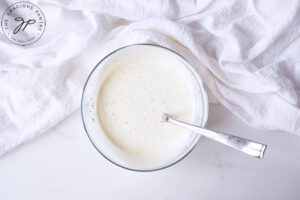 The Buttermilk Ranch Dressing Recipe ingredients mixed together in a small mixing bowl