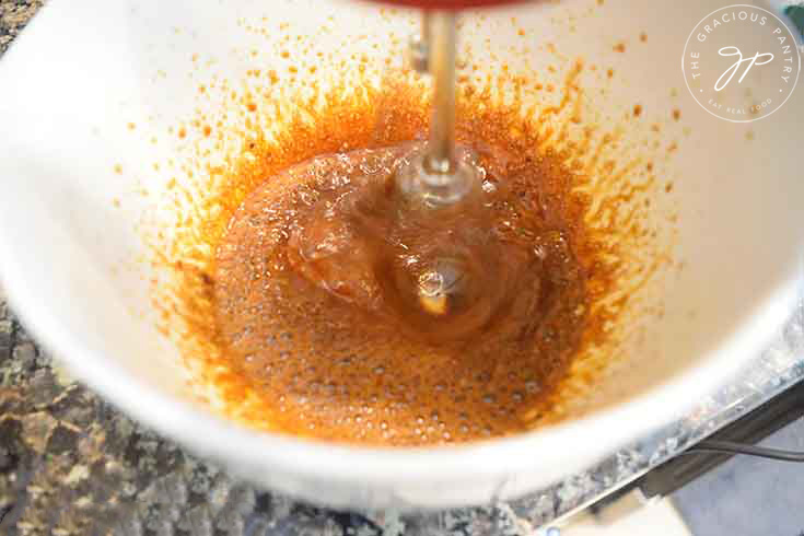 Blending the sweetener and instant coffee to make this Dalgona Coffee Recipe.